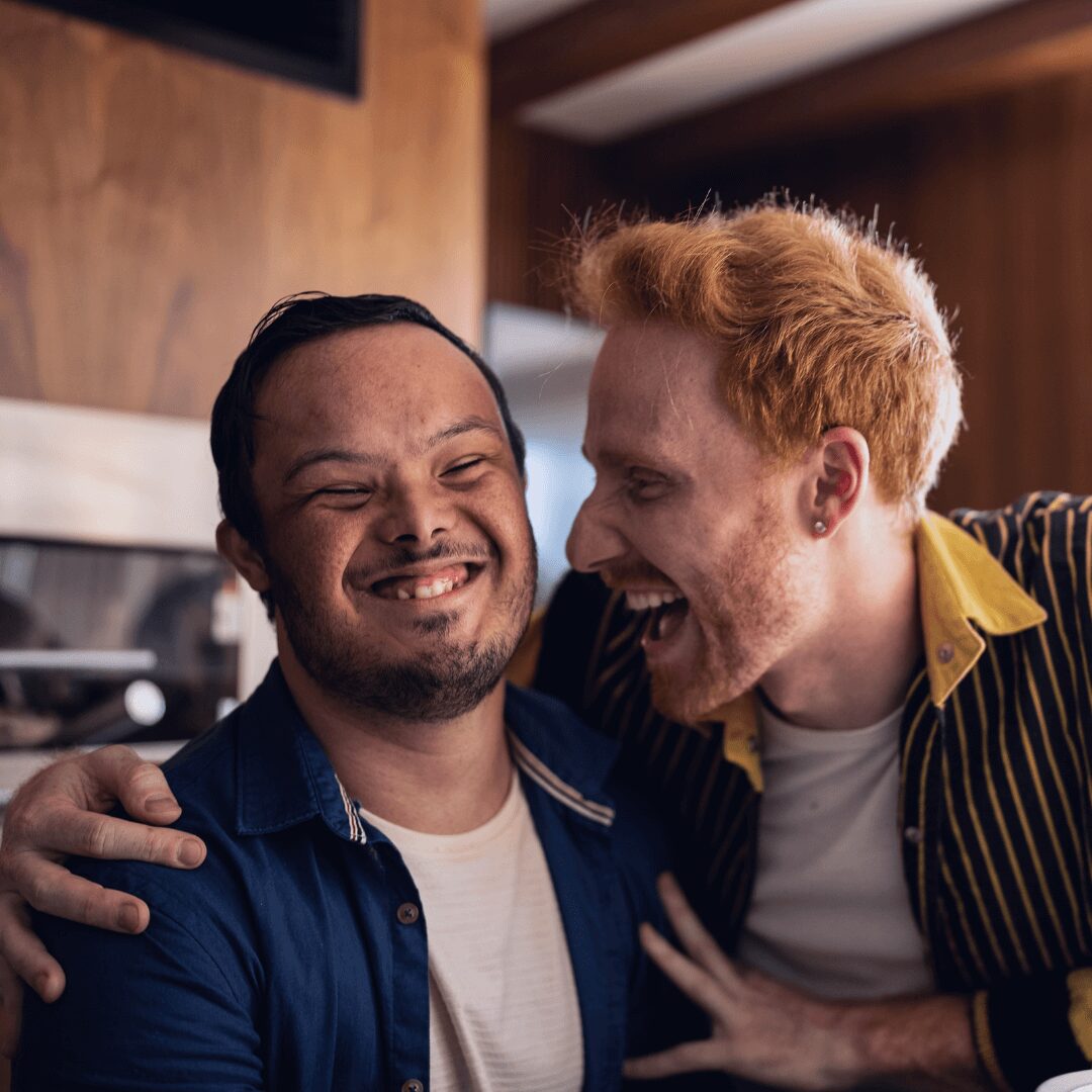 two people laughing together